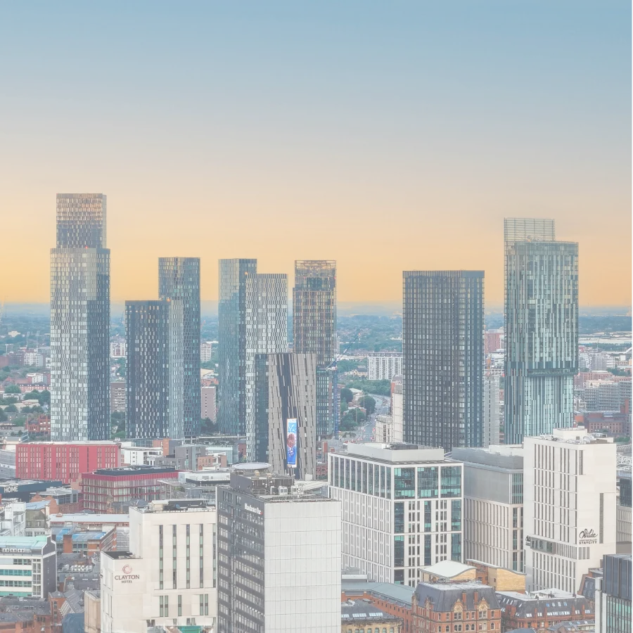 The Manchester skyline at sunset.